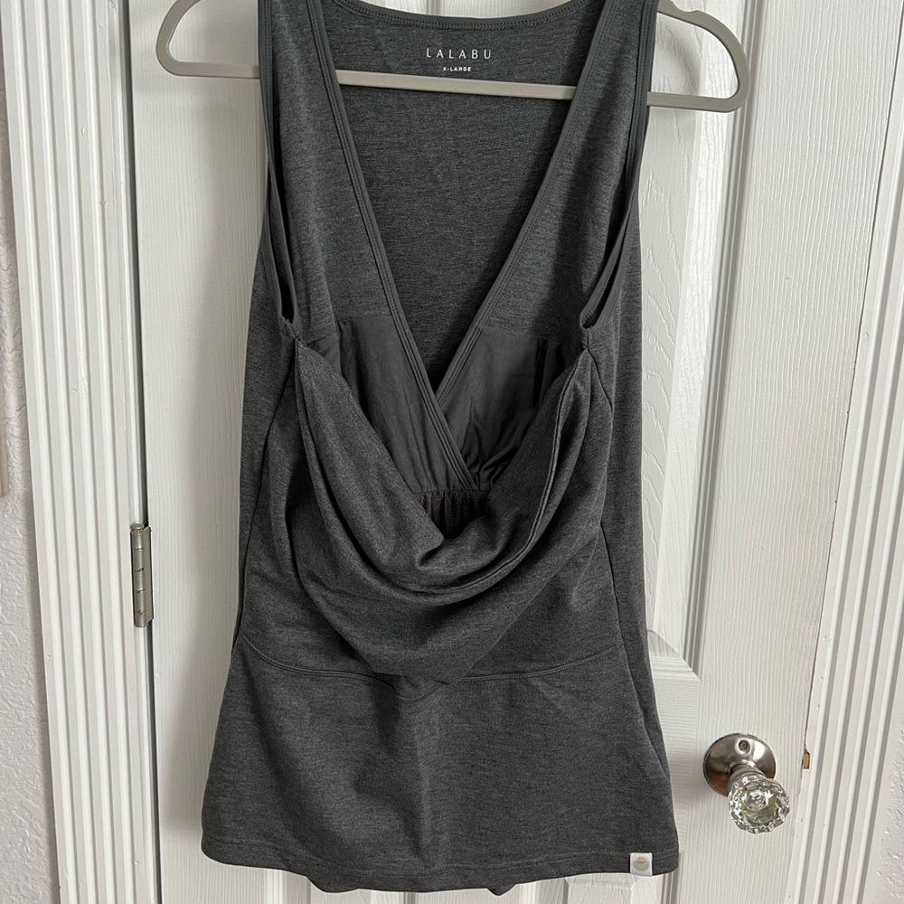 Lalabu baby wearing shirt